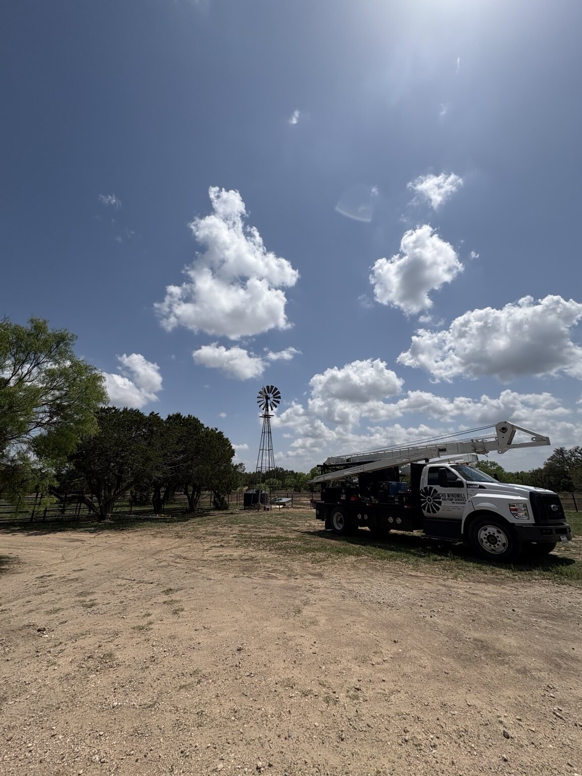 Concho Windmill service truck on a Texas ranch job site