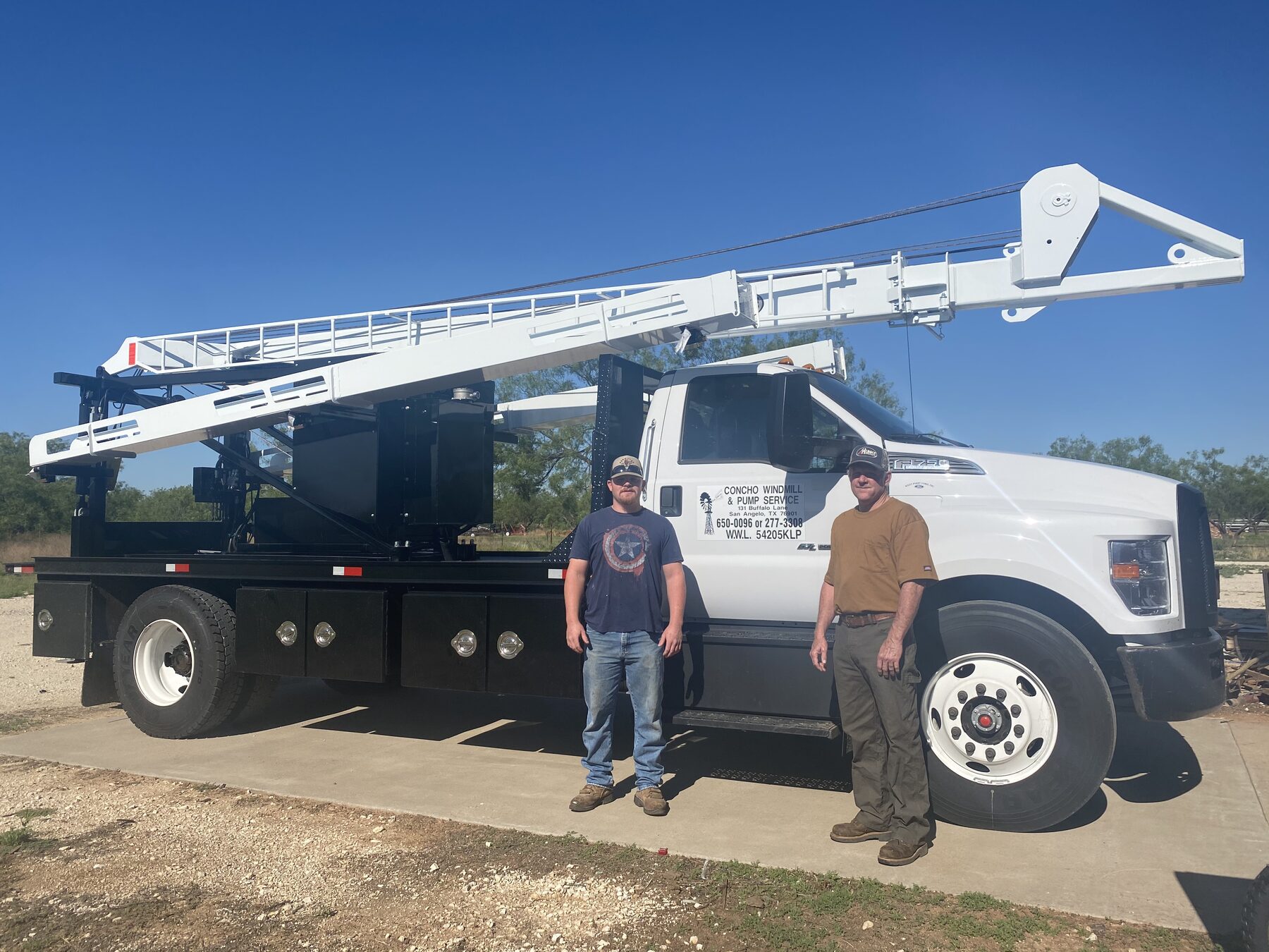 Concho Windmill crew with service truck